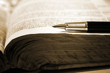 Image showing Old book and pen