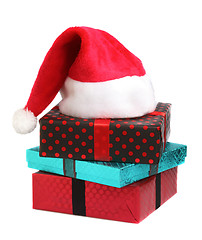 Image showing Christmas gift and santa hat 