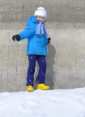 Image showing Young girl near the concrete wall