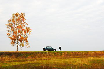 Image showing one person close to the car 