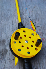 Image showing fishing rod with yellow reel 