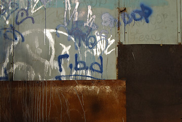 Image showing Grungy sheet iron construction wall