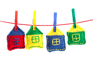 Image showing four knitted colorful houses 