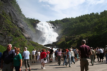 Image showing Tourists by the waterfall