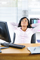 Image showing Black businesswoman resting at desk