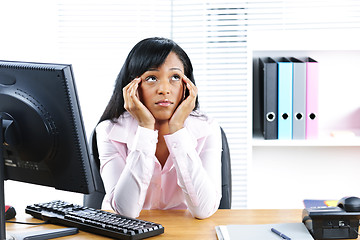 Image showing Bored black businesswoman in office