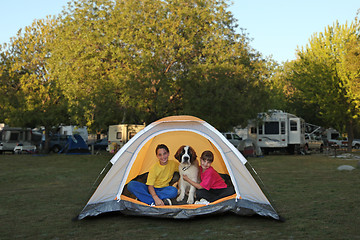 Image showing Girls and Dog in a Tent While Camping 