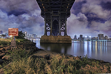 Image showing Brooklyn Bridge and Manhattan Skyline At Night NYC
