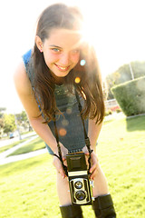 Image showing Happy Child Using a Vintage Camera to Shoot Film