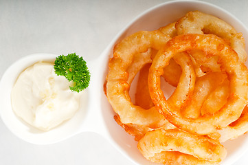 Image showing golden deep fried onion rings 