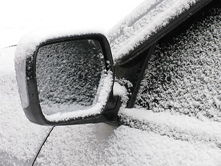 Image showing snow on a rear-view mirror