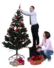 Image showing Decorating the Christmas tree