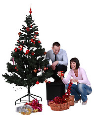 Image showing Decorating the Christmas tree