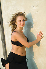 Image showing Young woman on roof