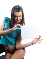 Image showing Young beautiful woman holding blank poster