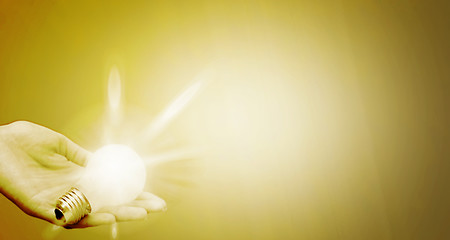 Image showing Background with lit lightbulb