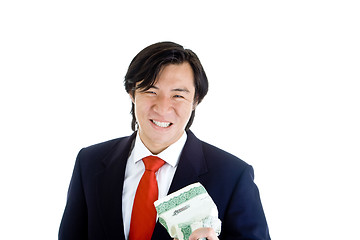 Image showing Asian Man Grimacing while Crushing Stock Certificate White Backg