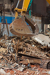 Image showing Demolition Equipment Claw, Pile of Debris at Work Site