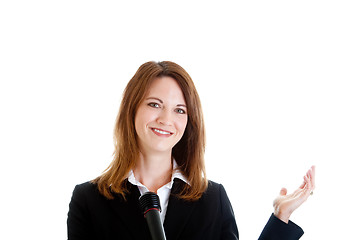 Image showing Happy Caucasian Businesswoman Holding Microphone and Gesturing W