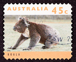 Image showing Canceled Australian Postage Stamp Koala Bear Sitting on Grassy G