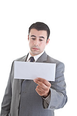 Image showing Sad Caucasian Hispanic Man Looking at Blank Envelope White Backg