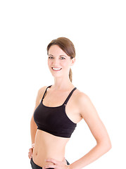 Image showing Slender Caucasian Woman in Sports Bra Smiling White Background