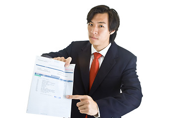 Image showing Asian Man Pointing Past Due Medical Bill Isolated White Backgrou