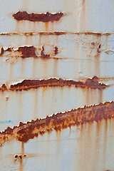 Image showing XXXL Full Frame Peeling Paint Rust Stains on Gray Metal Surface