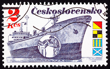 Image showing Czechoslovakian Stamp Czech Freighter Brno, Man Peering Radar