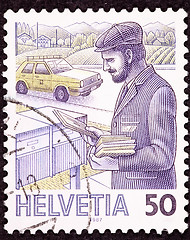 Image showing Canceled Swiss Postage Stamp Postman Delivering Letters Mail Box
