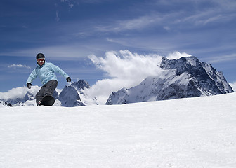 Image showing Snowboarding in high mountains