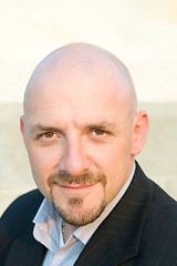 Image showing Head Shot 30's Bald Guy Goatee Looking at Camera