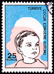 Image showing Canceled Turkish Postage Stamp Commemorating Social Services Boy