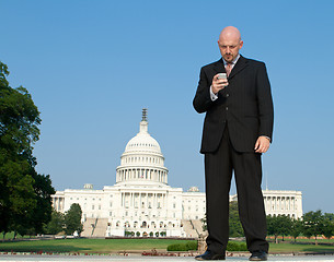 Image showing White Businessman Smart Phone Capitol Wash DC US