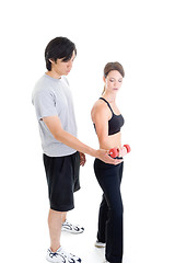 Image showing Asian Man Helping Woman Work Out, Isolated White