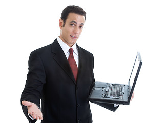 Image showing Businessman Gesturing, Holding Laptop Isolated on White Backgrou