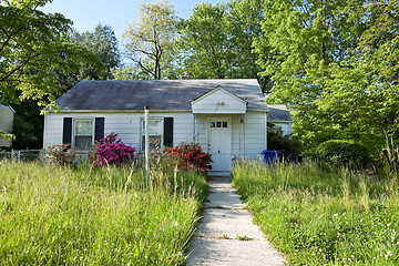 Image showing XXXL Front View Abandoned Foreclosed Cape Cod Home Long Grass