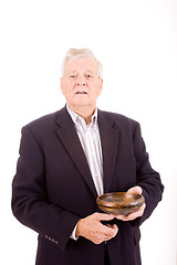 Image showing Older Caucasian Man Holding Wooden Bowl, Isolated