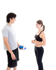 Image showing Asian Man Caucasian Woman Talking Working Out Gear White Backgro