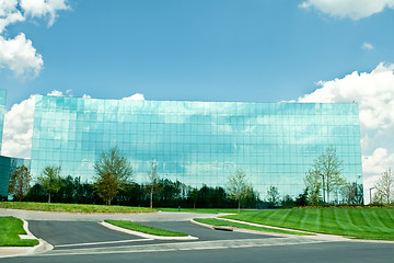 Image showing Ultra Modern Mirrored Glass Office Building in Maryland Blue Sky