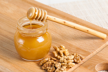 Image showing bee honey with walnuts