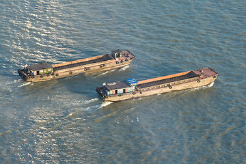 Image showing Barges On Huangpu River, Shangha, China, at Sunset