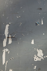 Image showing XXXL Gray Paint and Poster Paper Scraps Peeling Off Wall
