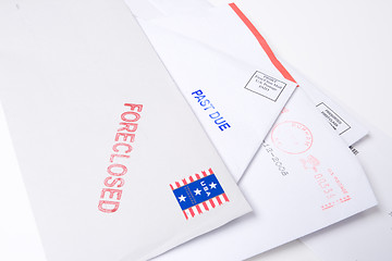 Image showing Pile Mail Stamped FORECLOSED PAST DUE Isolated