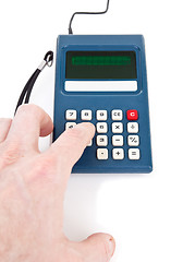 Image showing Hand Pushing Key Vintage Calculator Isolated White Background