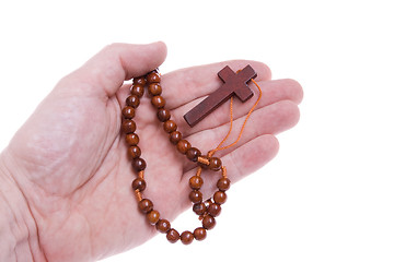 Image showing Hand Holding Rosary Cross Isolated White