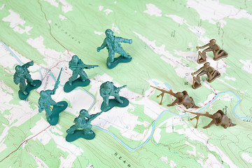 Image showing Plastic Army Men Fighting on Topographic Map General's View