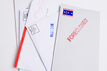 Image showing Pile Mail Stamped FORECLOSED PAST DUE Isolated