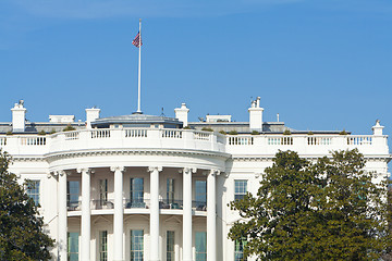 Image showing South Side of White House, American Flag, Blue Sky