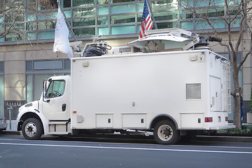 Image showing Television News Truck Van, Satellite Dish Roof, Parked on Street